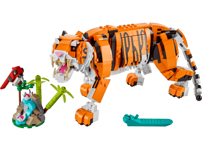 lego rental Toy tiger figure with a small green island and bird on a transparent background